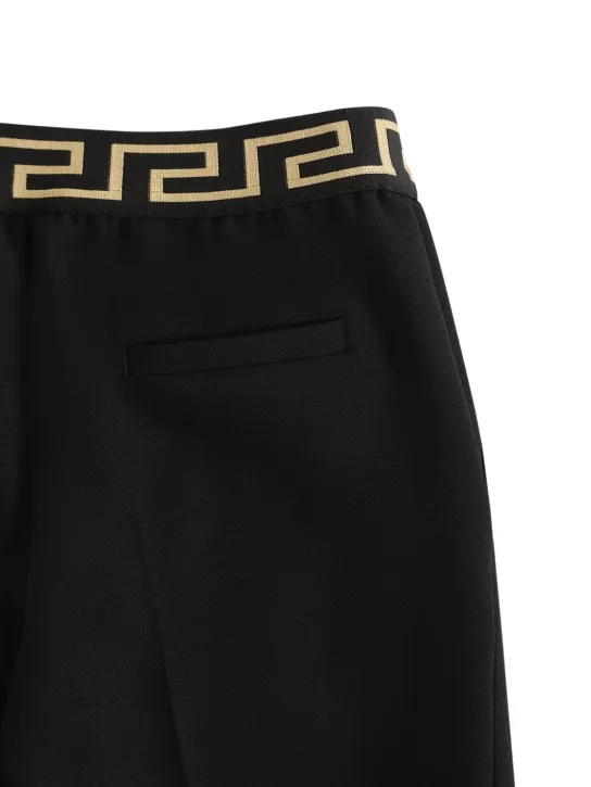 Versace   Greca logo stretch cady pants 